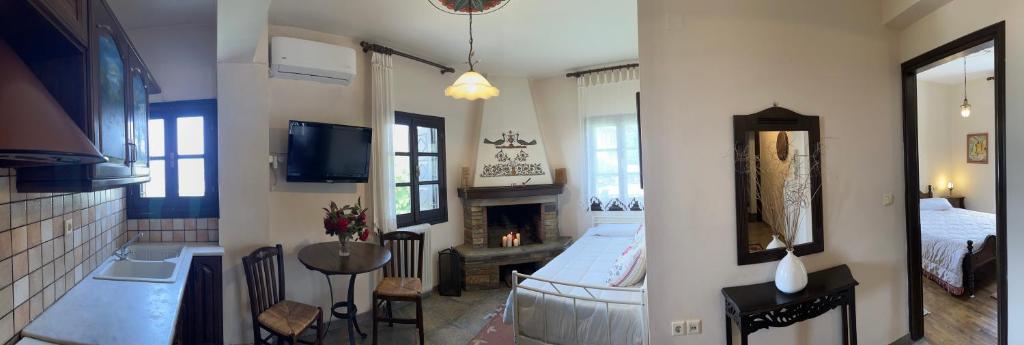TV a/nebo společenská místnost v ubytování Guesthouse Filokalia