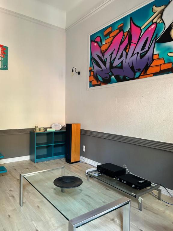 Posezení v ubytování Graffiti Downtown Room