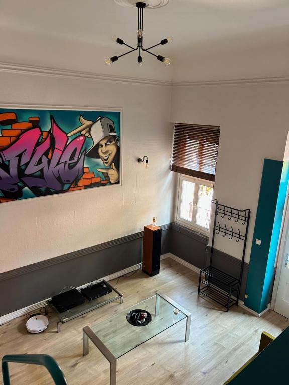 Posezení v ubytování Graffiti Downtown Room