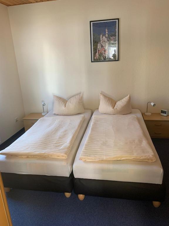 Postel nebo postele na pokoji v ubytování Ferienwohnung Wede