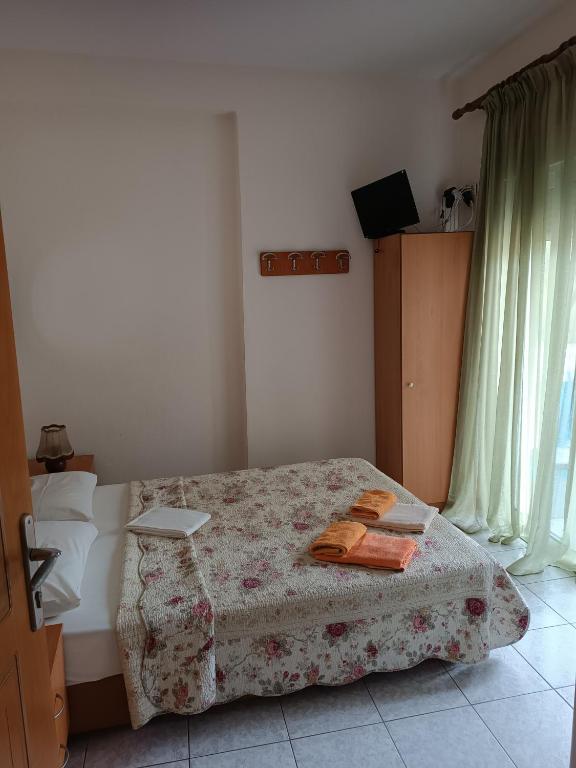 Postel nebo postele na pokoji v ubytování Anestis Apartments & rooms