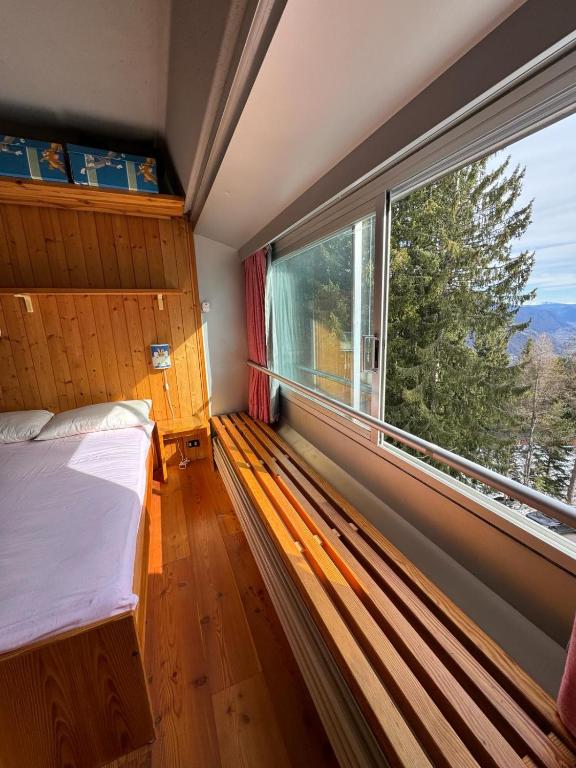 Postel nebo postele na pokoji v ubytování Casetta al Sole Alto