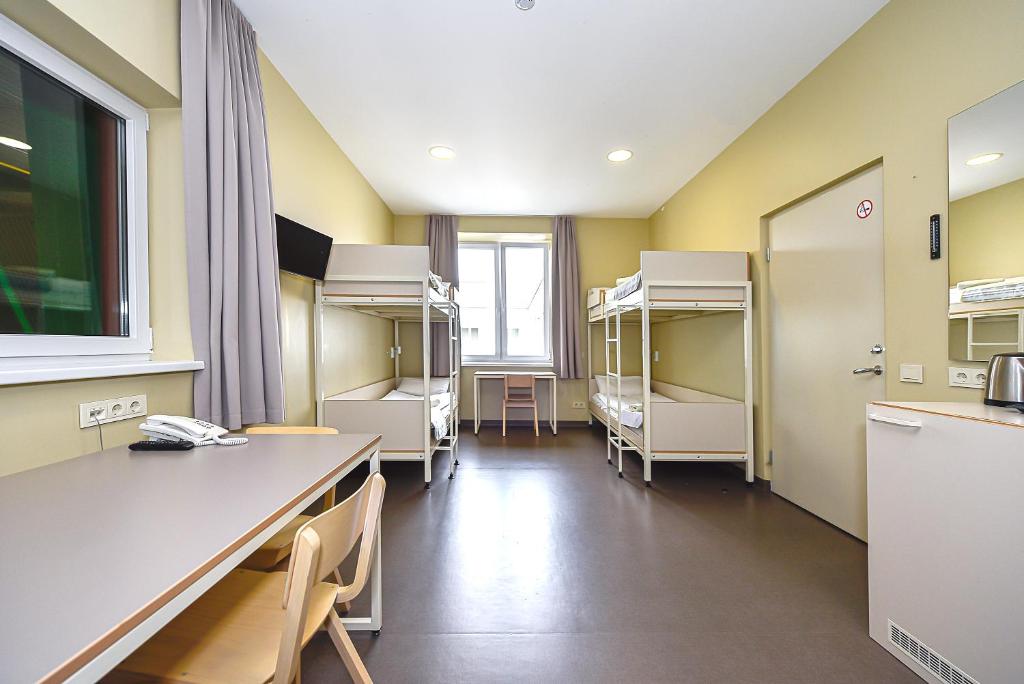 Kuchyň nebo kuchyňský kout v ubytování Nykščio Hostel