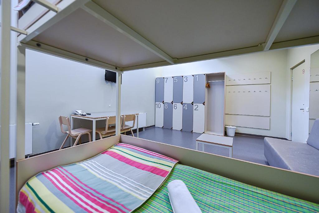 Kuchyň nebo kuchyňský kout v ubytování Nykščio Hostel