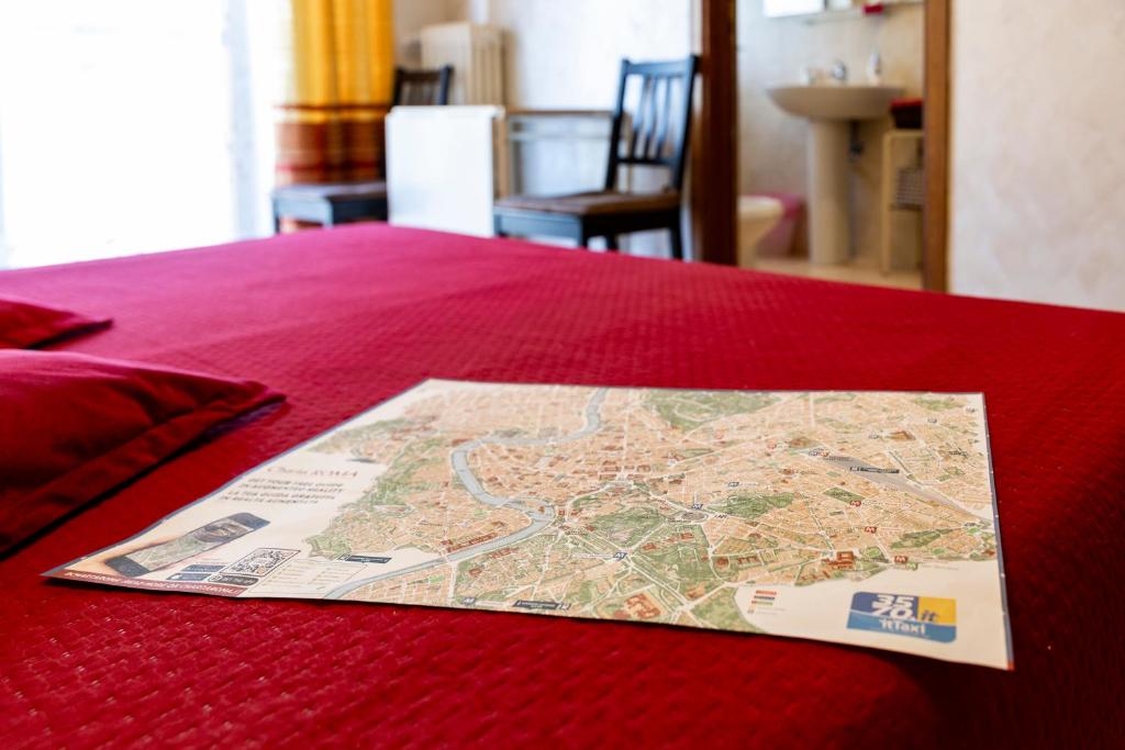 A bed or beds in a room at La Stazione Del Vaticano