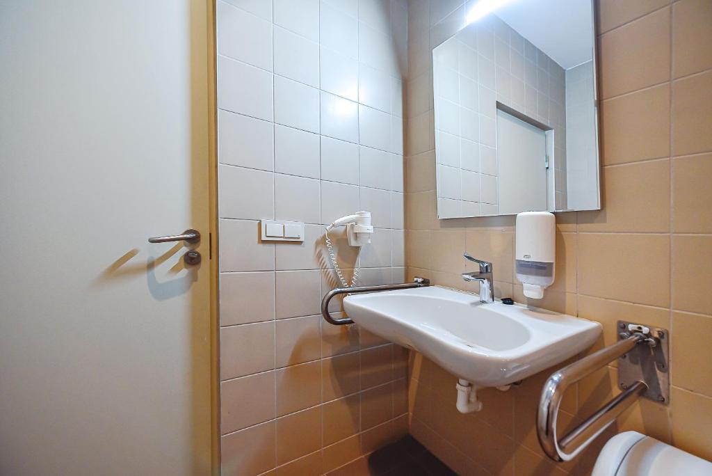 Koupelna v ubytování Nykščio Hostel