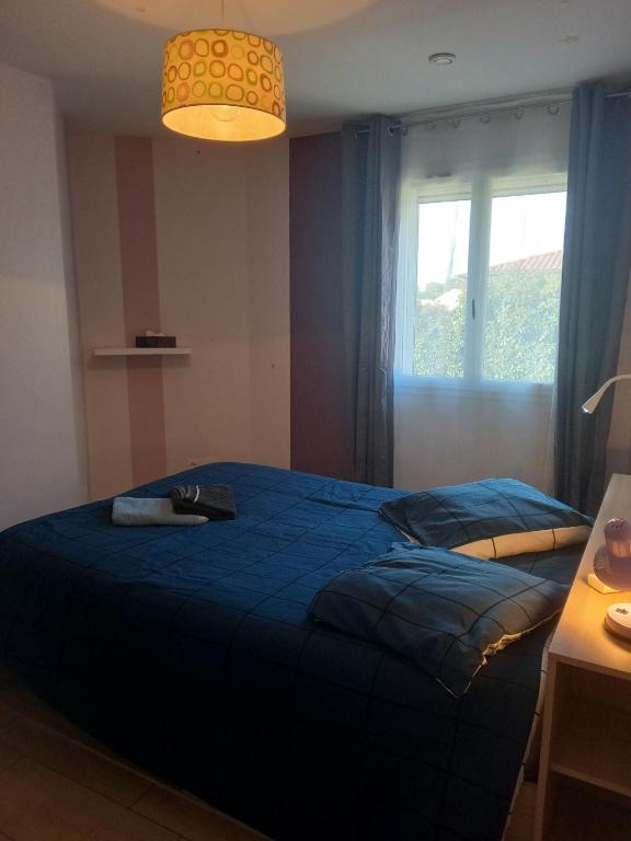 Postel nebo postele na pokoji v ubytování Maison avec piscine, Ker Animheart