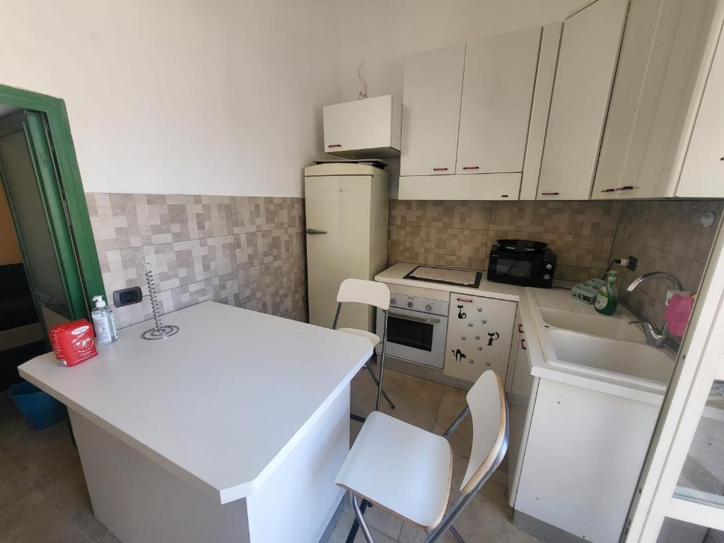 Kuchyň nebo kuchyňský kout v ubytování GeMy Apartment