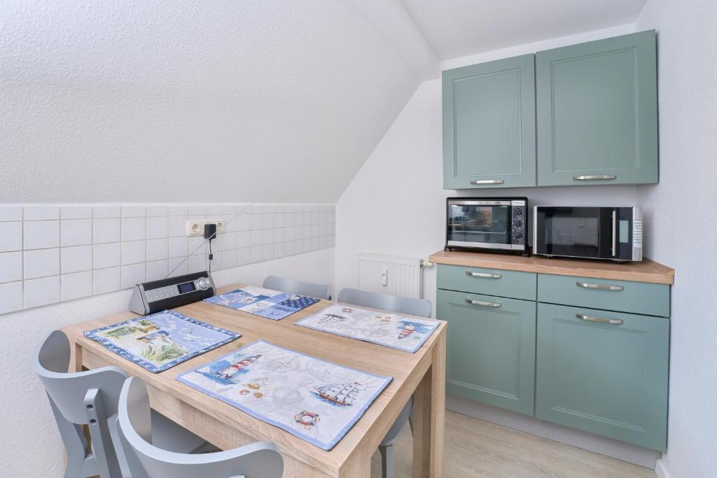 Kuchyň nebo kuchyňský kout v ubytování Ferienwohnung Leipzig Süd