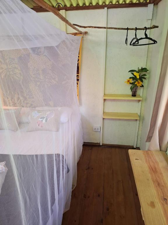 Postel nebo postele na pokoji v ubytování YbYmara Eco Glamping