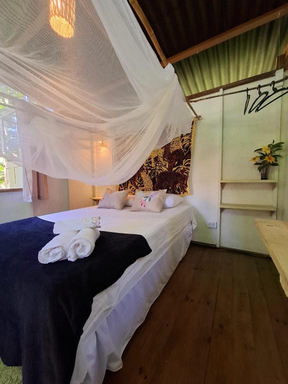 Postel nebo postele na pokoji v ubytování YbYmara Eco Glamping