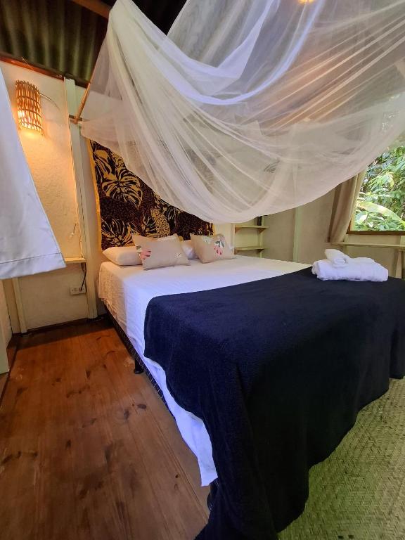 Postel nebo postele na pokoji v ubytování YbYmara Eco Glamping