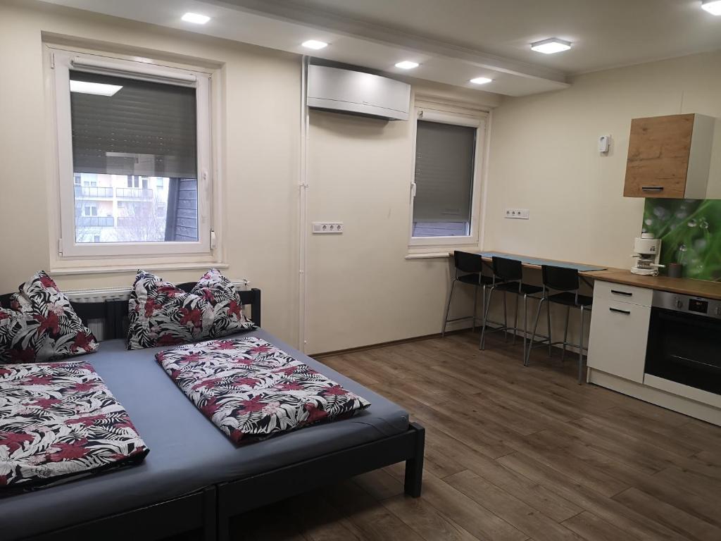 Kuchyňa alebo kuchynka v ubytovaní Tp Apartman