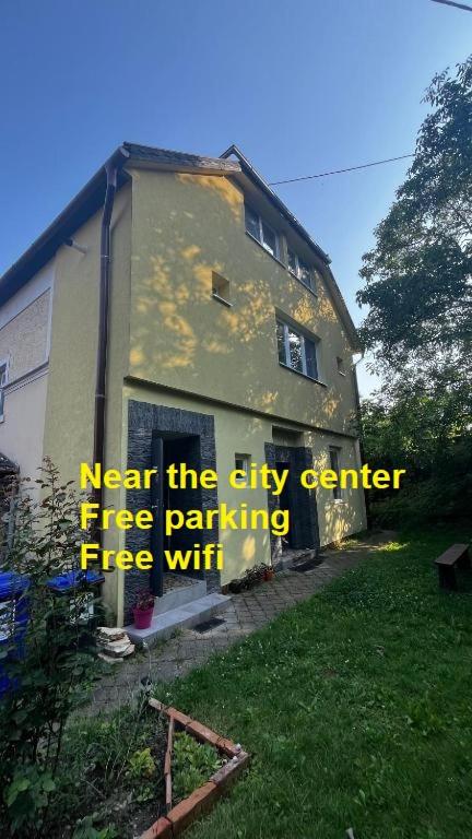 a sign is on the side of a building at MZ Apartment in Trenčín