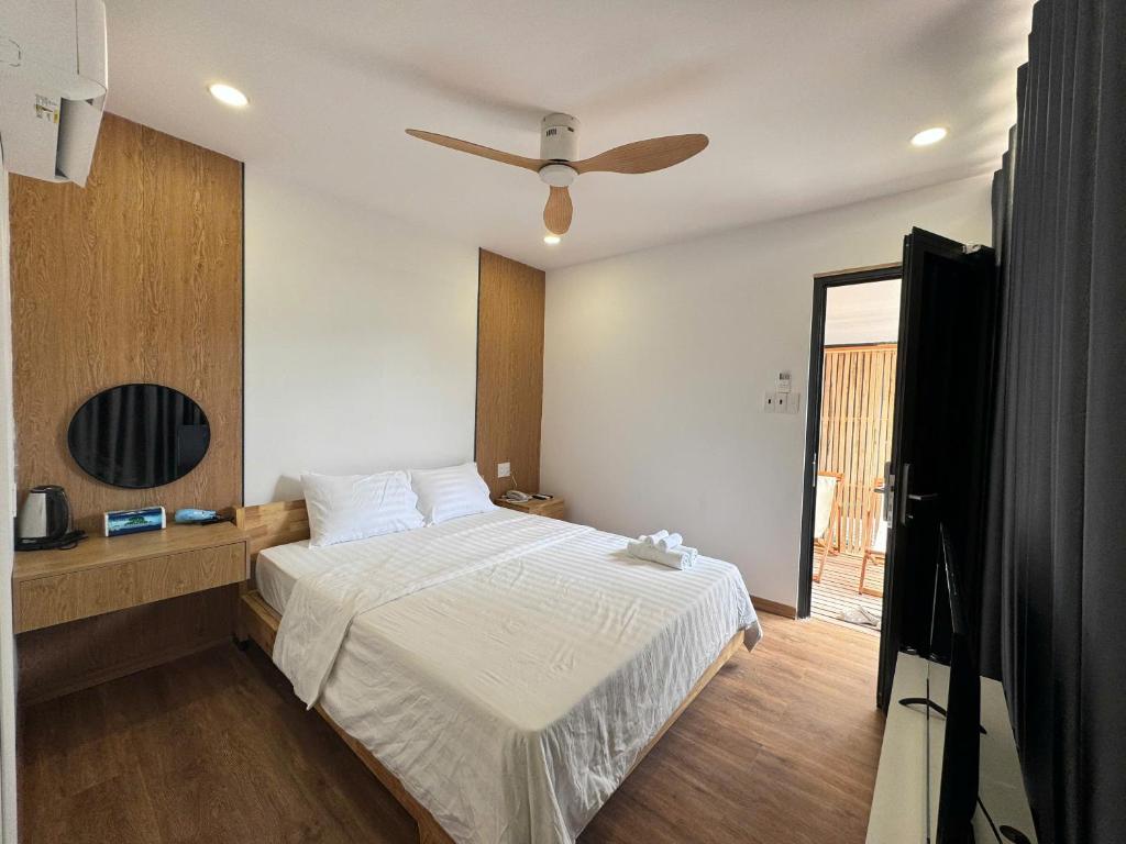 Postel nebo postele na pokoji v ubytování Wanderlust garden inn