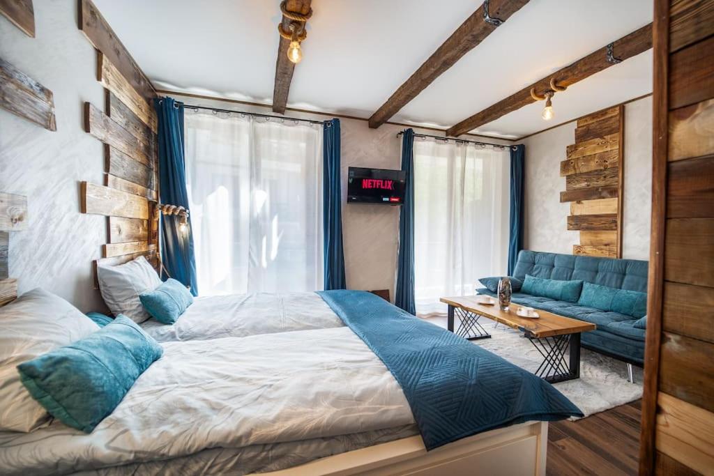 Postel nebo postele na pokoji v ubytování Predela Heaven - FREE SPA - SKI in - out