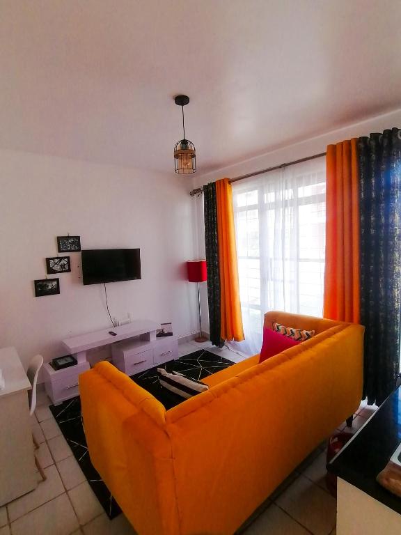 TV a/nebo společenská místnost v ubytování Classy Studio Apartment racecourse Gardens