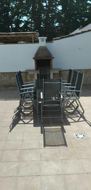 a table and chairs sitting on top of a patio at Casa céntrica en Girona in Girona