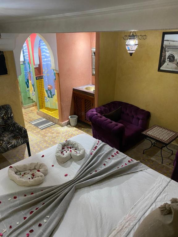 Postel nebo postele na pokoji v ubytování Riad Layla Rouge