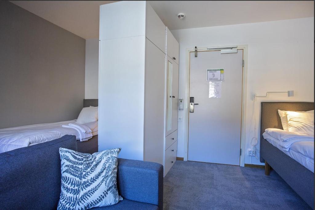 Postel nebo postele na pokoji v ubytování Forenom Hostel Gothenburg Säve