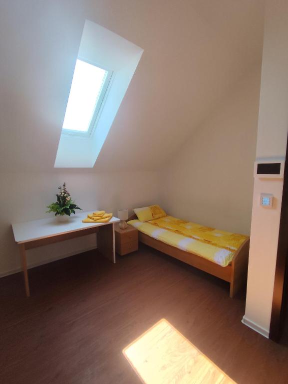 Postel nebo postele na pokoji v ubytování Ferienhaus SWD
