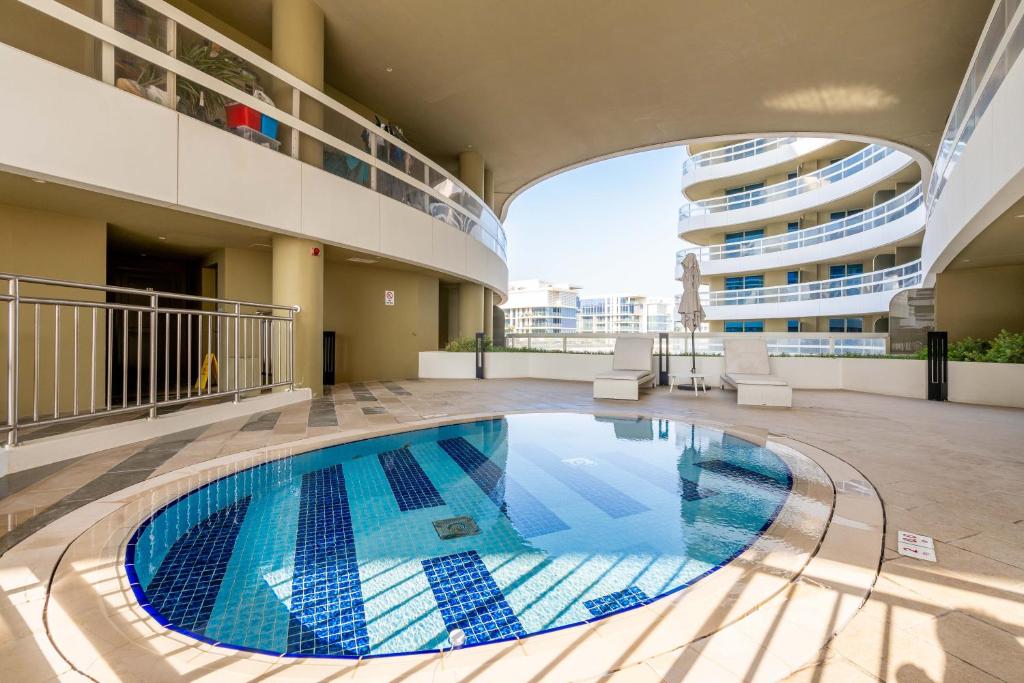 Bazén v ubytování Luxury Saadiyat Soul Beach Residence nebo v jeho okolí