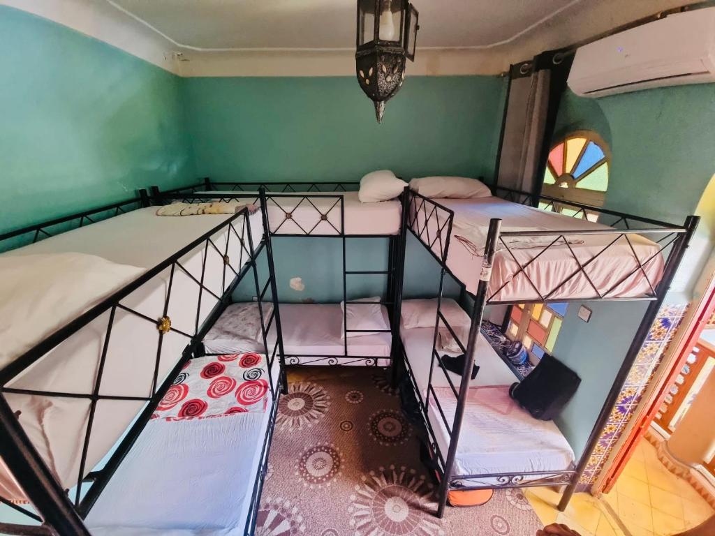 Postel nebo postele na pokoji v ubytování Riad Dia