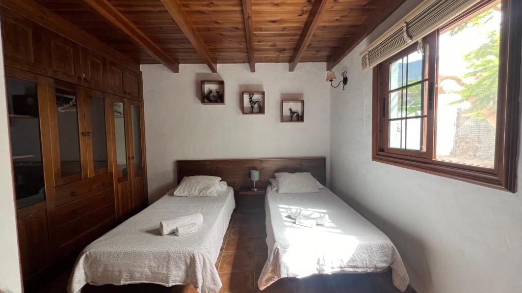 Postel nebo postele na pokoji v ubytování Casa Arteaga