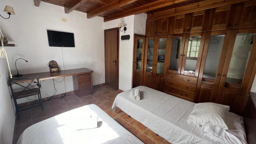 Postel nebo postele na pokoji v ubytování Casa Arteaga