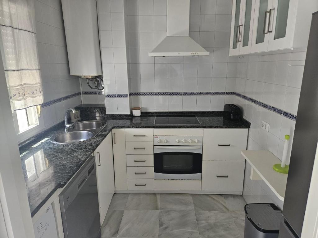 Kuchyň nebo kuchyňský kout v ubytování Precioso Apartamento en el centro, Parking Gratis