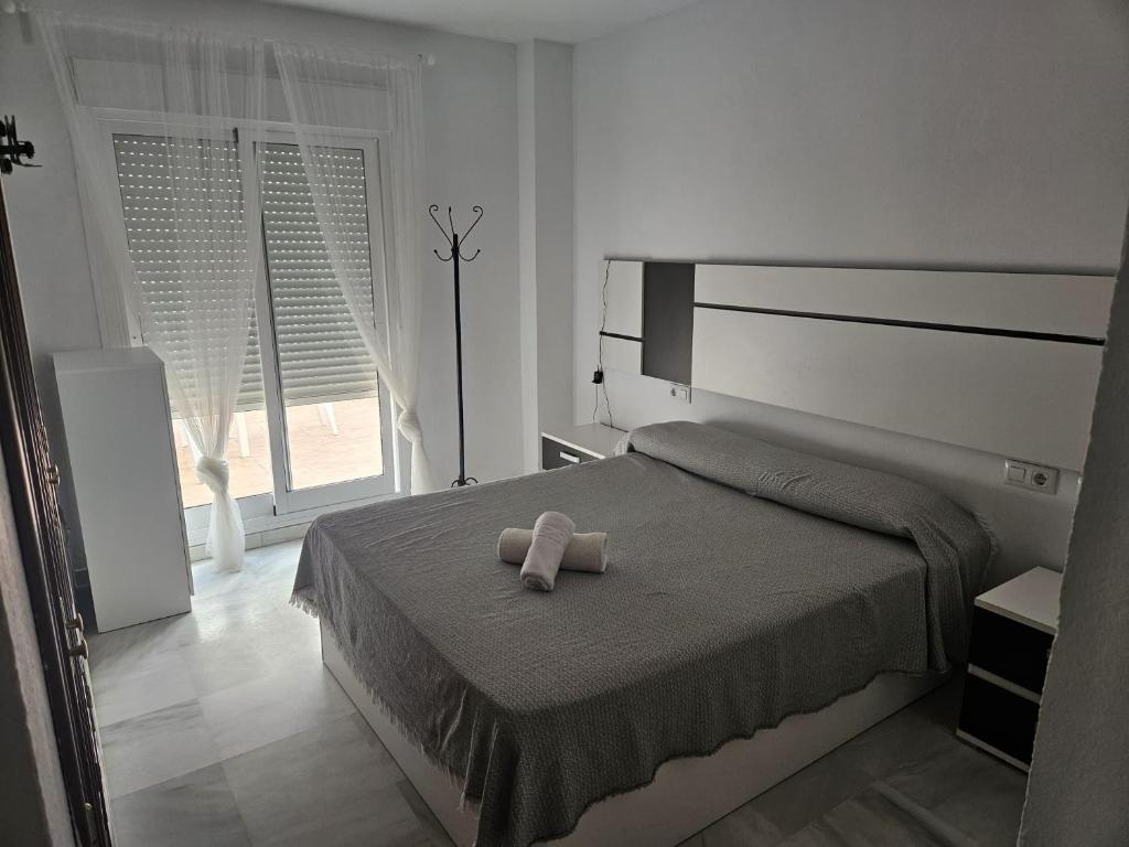 Postel nebo postele na pokoji v ubytování Precioso Apartamento en el centro, Parking Gratis