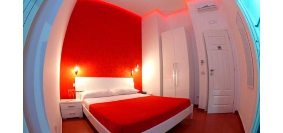 Postel nebo postele na pokoji v ubytování MergellinaResort