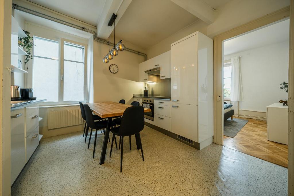 Kuchyň nebo kuchyňský kout v ubytování City Apartment with Rooftop Terrace