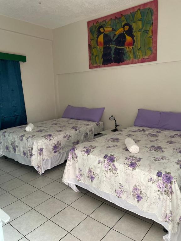 Voodi või voodid majutusasutuse The Seaside Garden Guesthouse toas