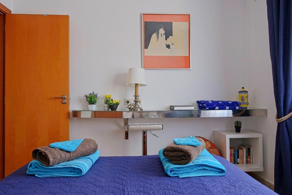 Postel nebo postele na pokoji v ubytování Blue Ark