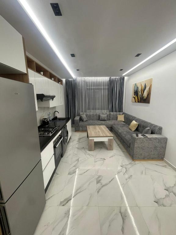 Kuchyň nebo kuchyňský kout v ubytování Oumaira Residence Azla-Tetouan
