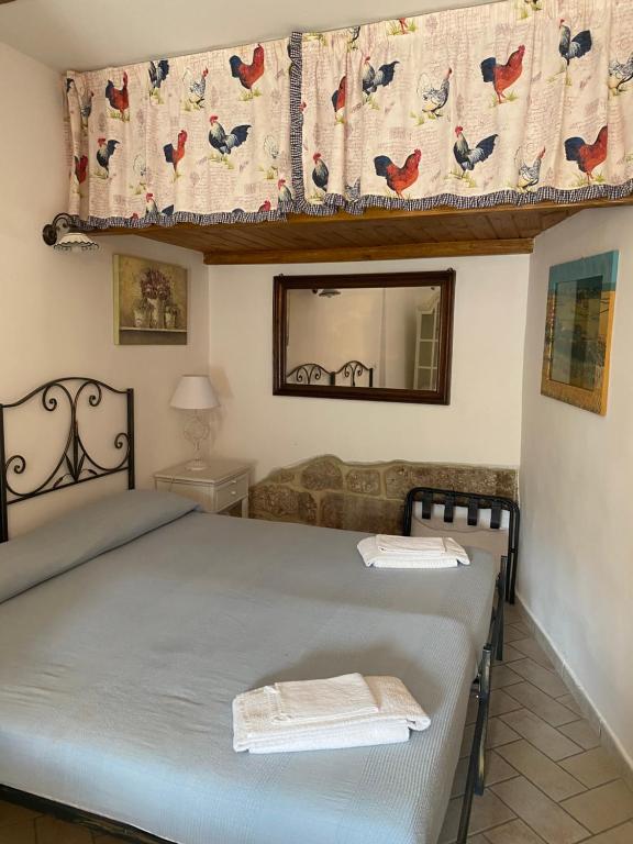 A bed or beds in a room at Maison Dina