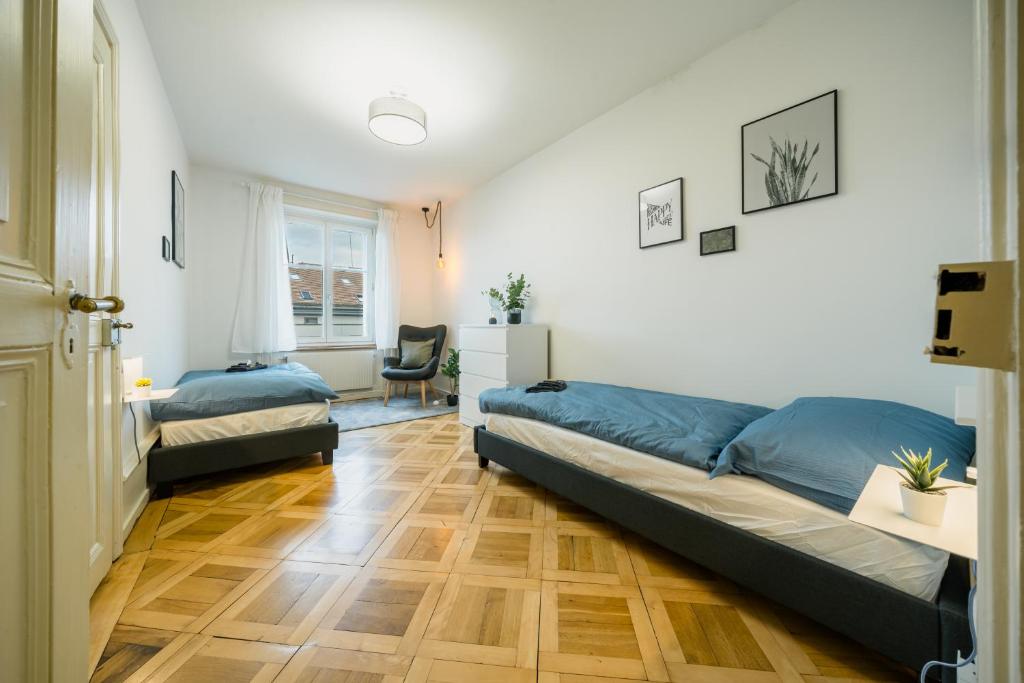 Postel nebo postele na pokoji v ubytování City Apartment with Rooftop Terrace