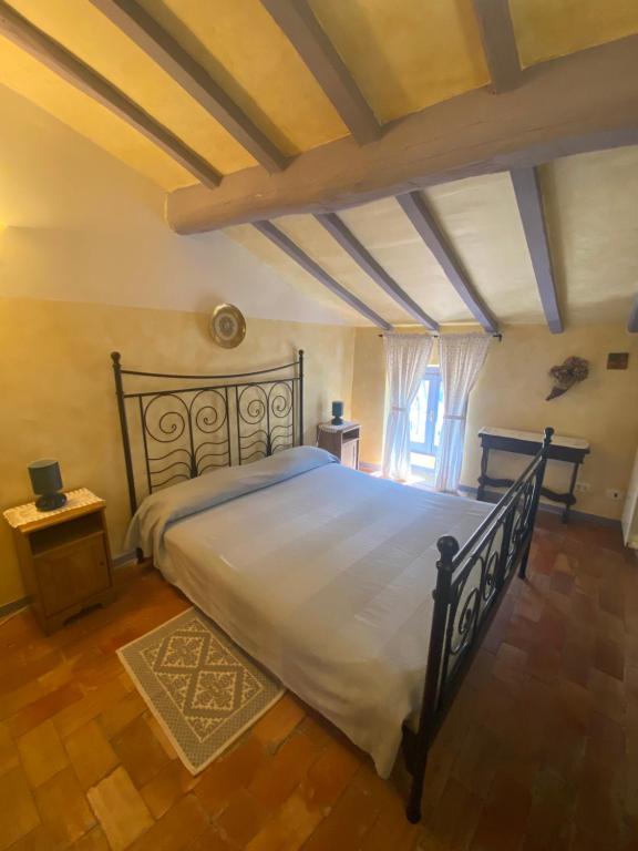 A bed or beds in a room at Maison Dina
