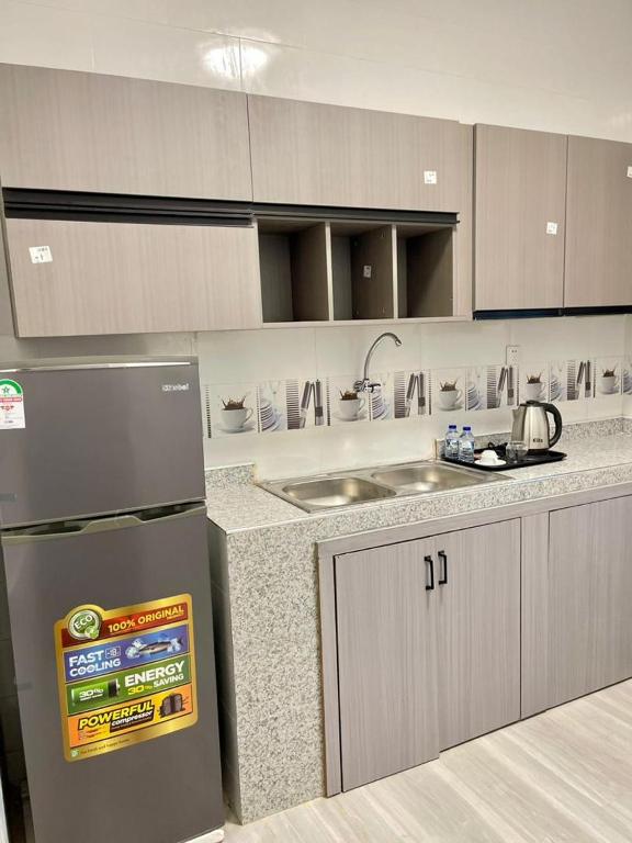 Kuchyň nebo kuchyňský kout v ubytování Milennium Hotel Nouadhibou