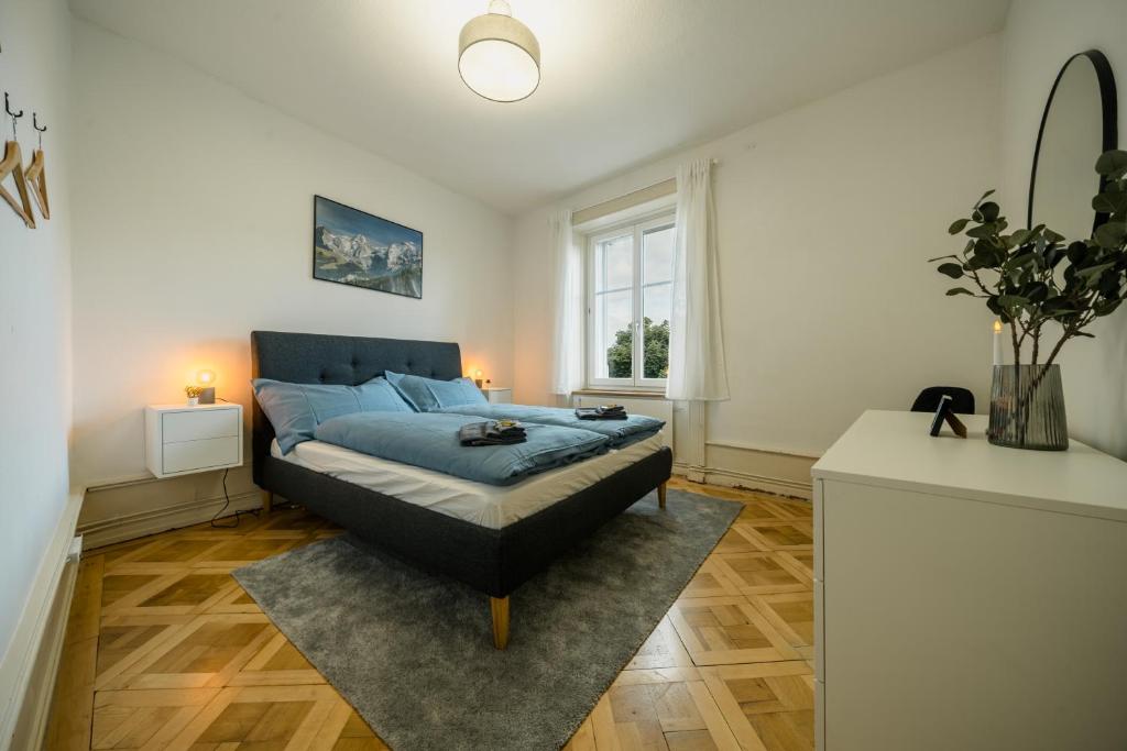 Postel nebo postele na pokoji v ubytování City Apartment with Rooftop Terrace