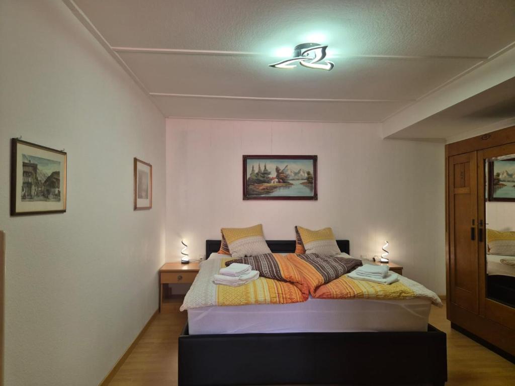 Postel nebo postele na pokoji v ubytování Chalet Aargovia South