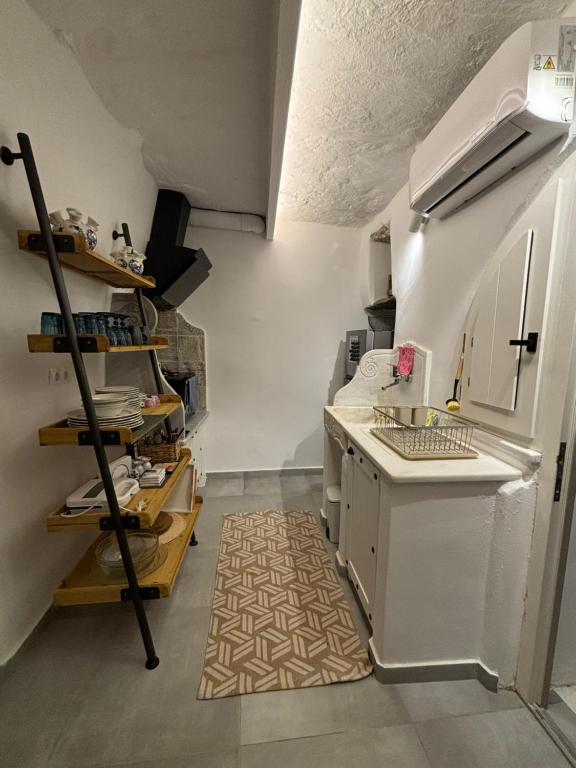 Kuchyň nebo kuchyňský kout v ubytování Serenity Living Platia, Tinos