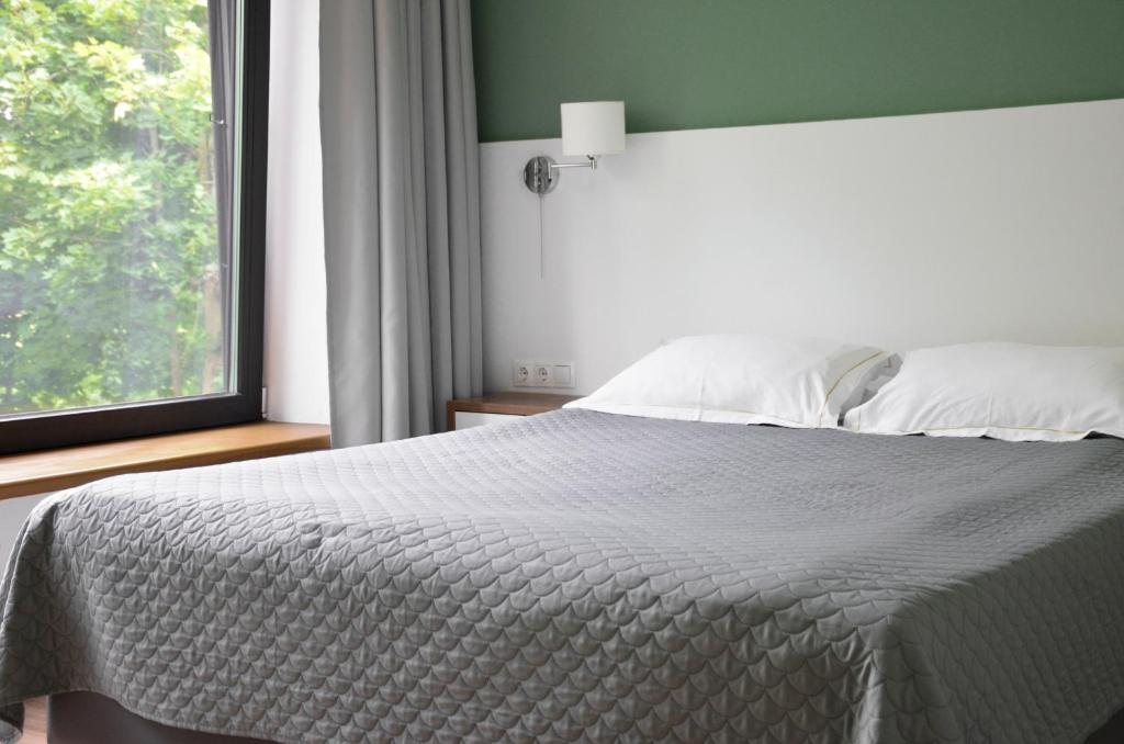 Postel nebo postele na pokoji v ubytování Tip Tap Guest House