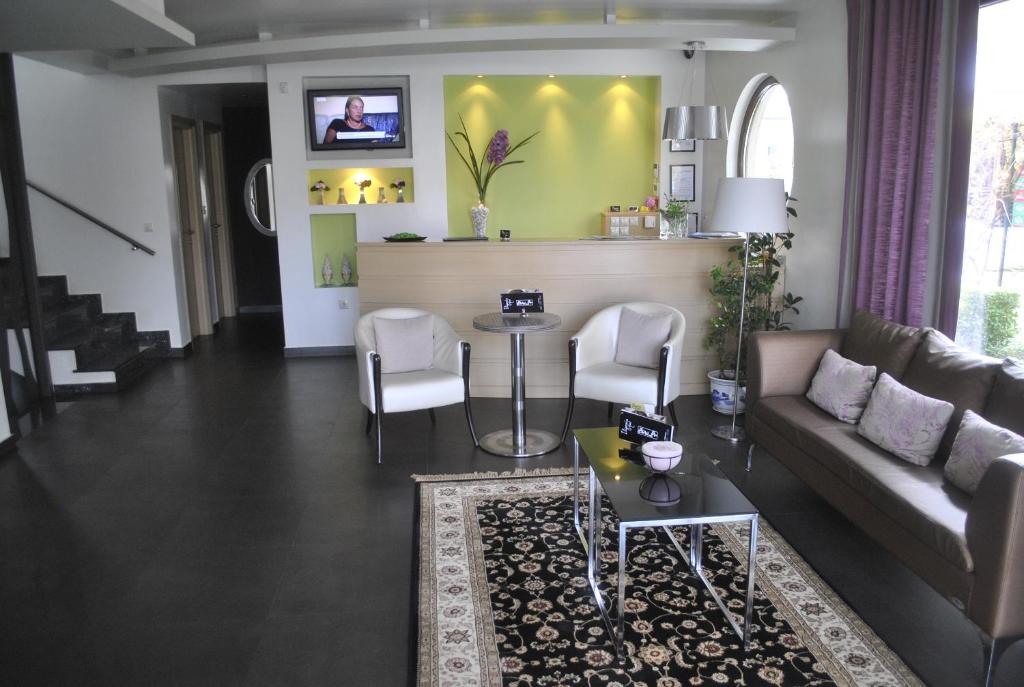 Posezení v ubytování Hotel Ifigenia