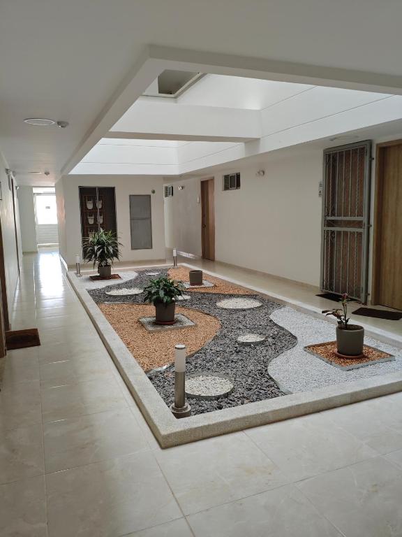 a large room with a large rug on the floor at Apartamento Portal 18 in San Alonso