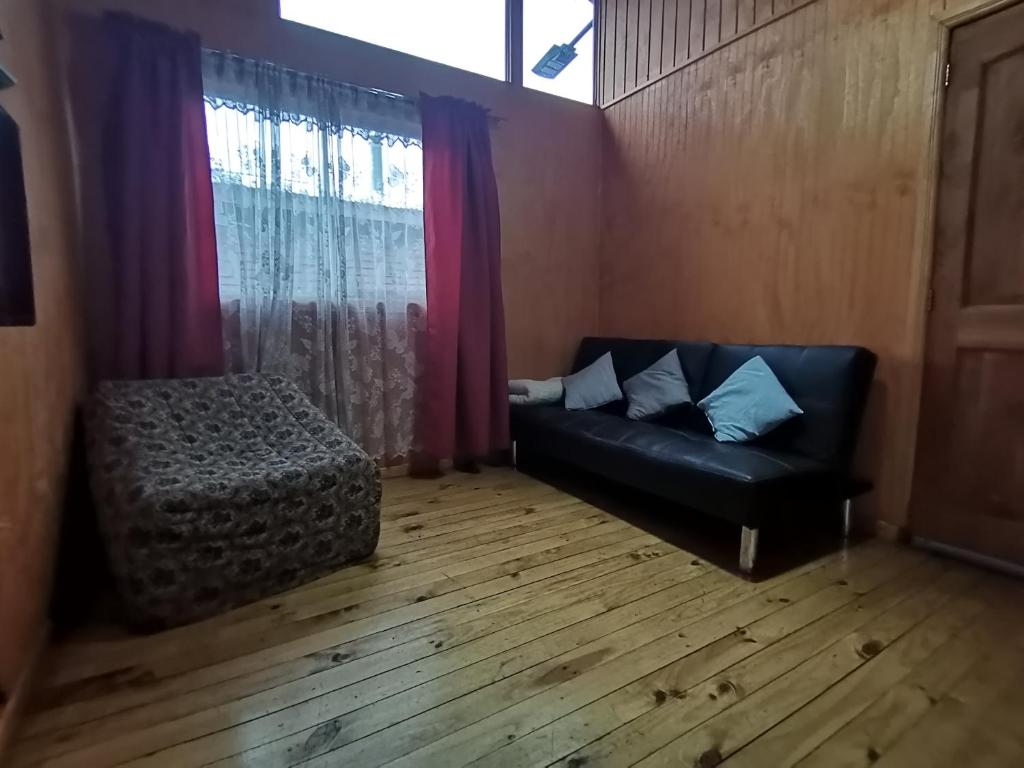 Zona de estar de Cabañas EcoSur - Chile