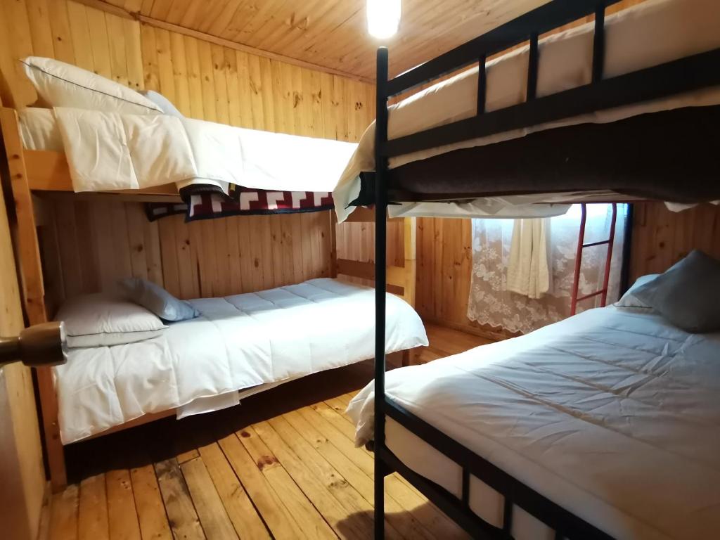 Cama o camas de una habitación en Cabañas EcoSur - Chile