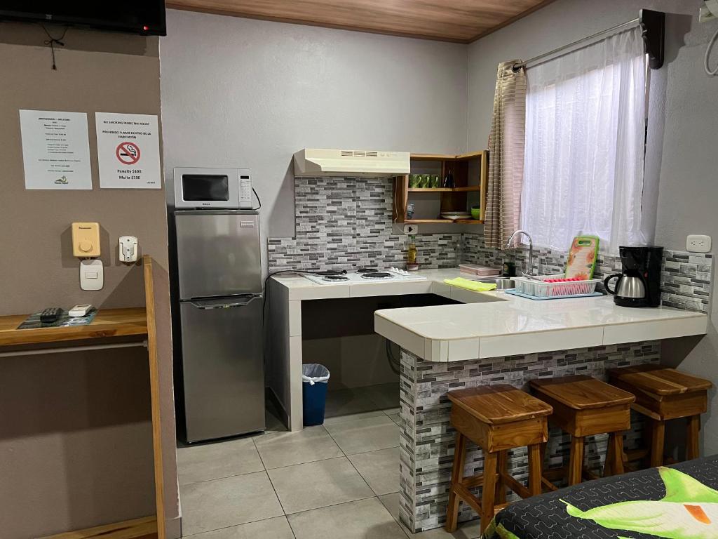 Kuchyň nebo kuchyňský kout v ubytování Apartamentos Mansión Tropical