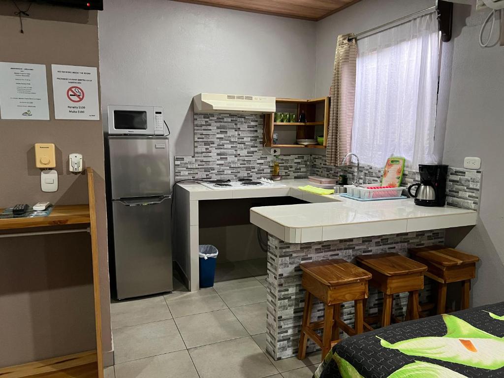 Kuchyň nebo kuchyňský kout v ubytování Apartamentos Mansión Tropical